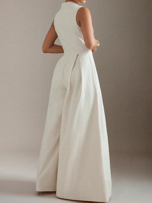 Ärm- och benlös jumpsuit med dragkedja och vida ben