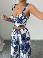 Set top imprimat cu decolteu în V + pantaloni largi