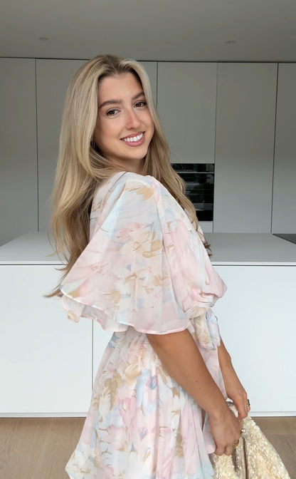 MINIKLÄNNING MED BLUMMAR