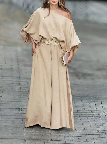 Set med blus med lanternärm och byxor, med bar axlar