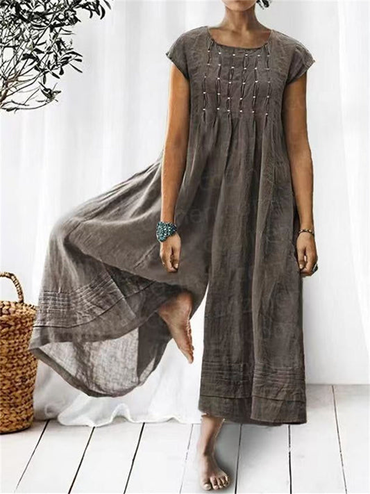 Plisserad jumpsuit med vida ben