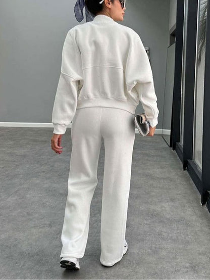 Kostym för kvinnor med zip-up cardigan och raka byxor