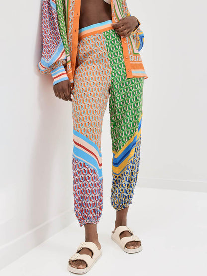 Bredbenta Bloomers med Elastisk Midja och Unika Färgglada Mönster