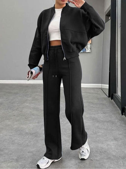 Kostym för kvinnor med zip-up cardigan och raka byxor