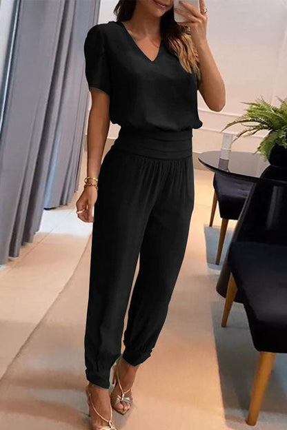 Set med två delar, långbyxor, kort ärm och V-ringning, med avslappnat mönster