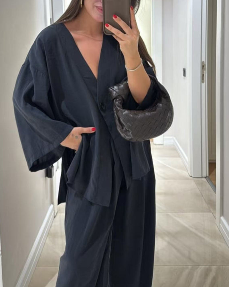 Set med två delar: casual topp med V-ringning och byxor