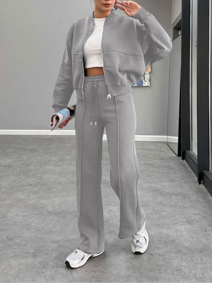 Kostym för kvinnor med zip-up cardigan och raka byxor