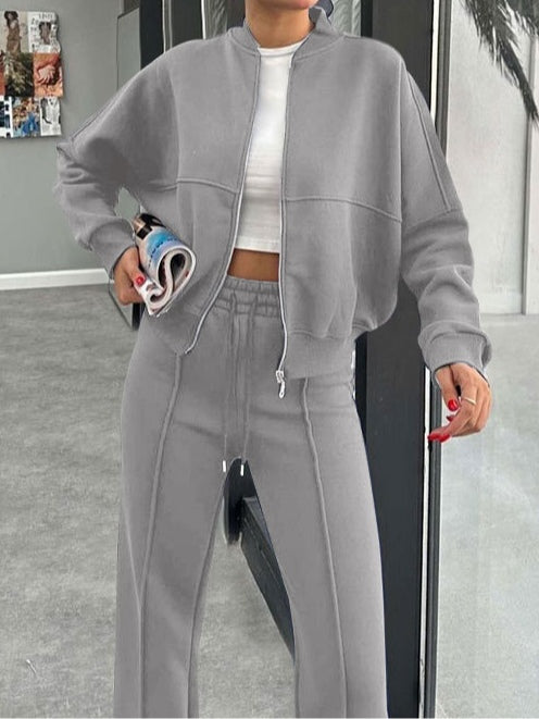 Kostym för kvinnor med zip-up cardigan och raka byxor