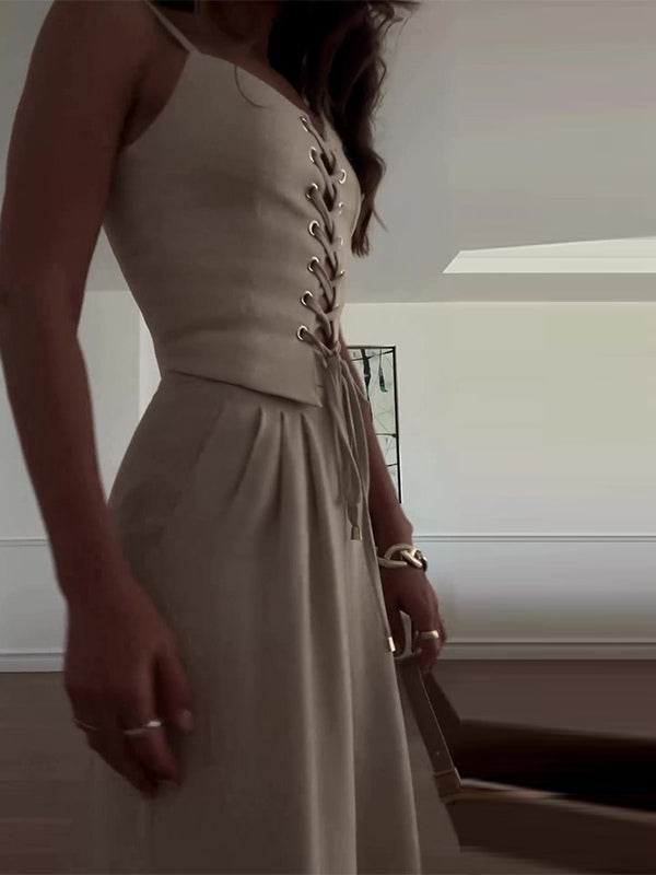 Set med två delar med axelband och rosett i linneblandning