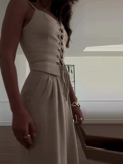 Set med två delar med axelband och rosett i linneblandning