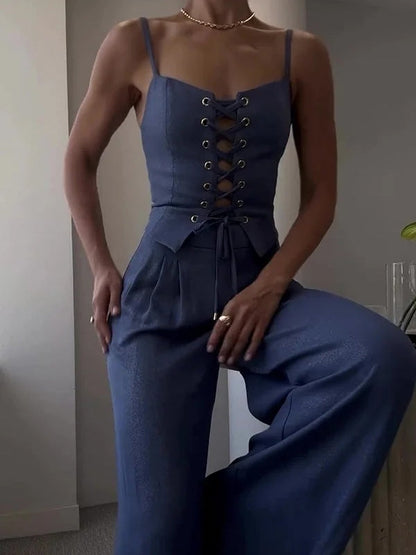 Set med två delar med axelband och rosett i linneblandning