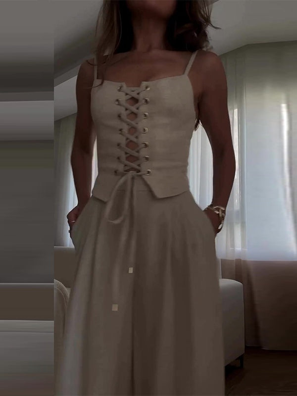 Set med två delar med axelband och rosett i linneblandning