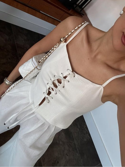 Set med två delar med axelband och rosett i linneblandning