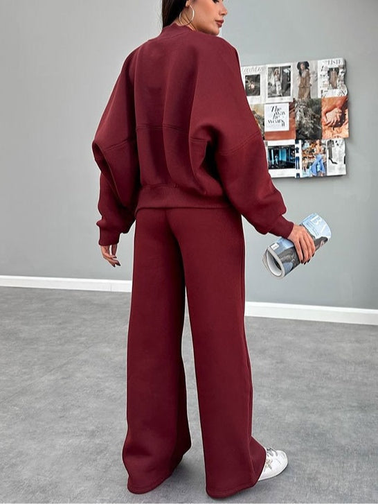 Kostym för kvinnor med zip-up cardigan och raka byxor