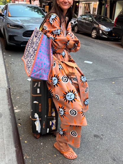 Stickad tröja med lång ärm, tryckt med sol