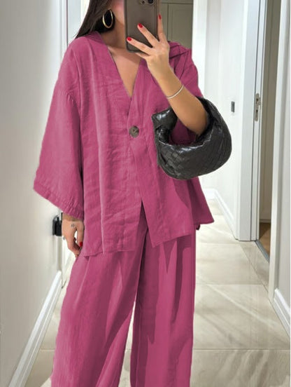 Set med två delar: casual topp med V-ringning och byxor