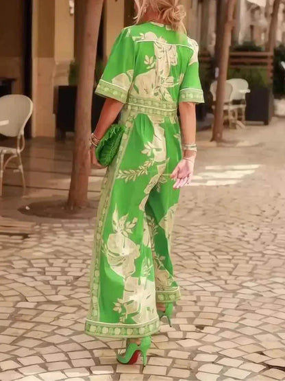 Kort jumpsuit med blommönster för semester, V-ringning
