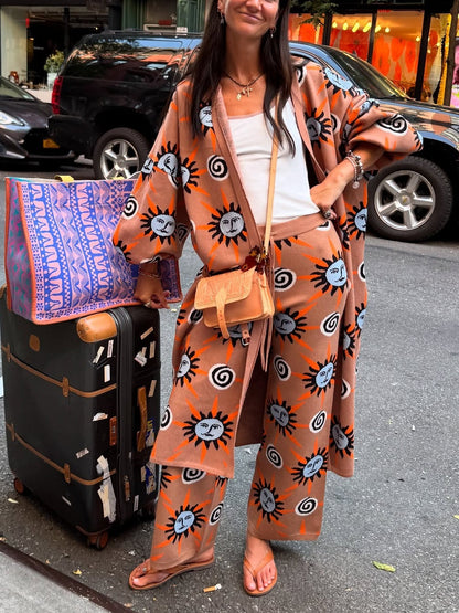 Stickad tröja med lång ärm, tryckt med sol