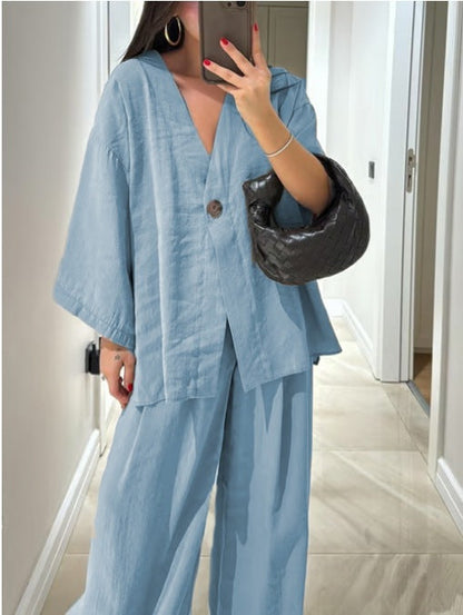 Set med två delar: casual topp med V-ringning och byxor