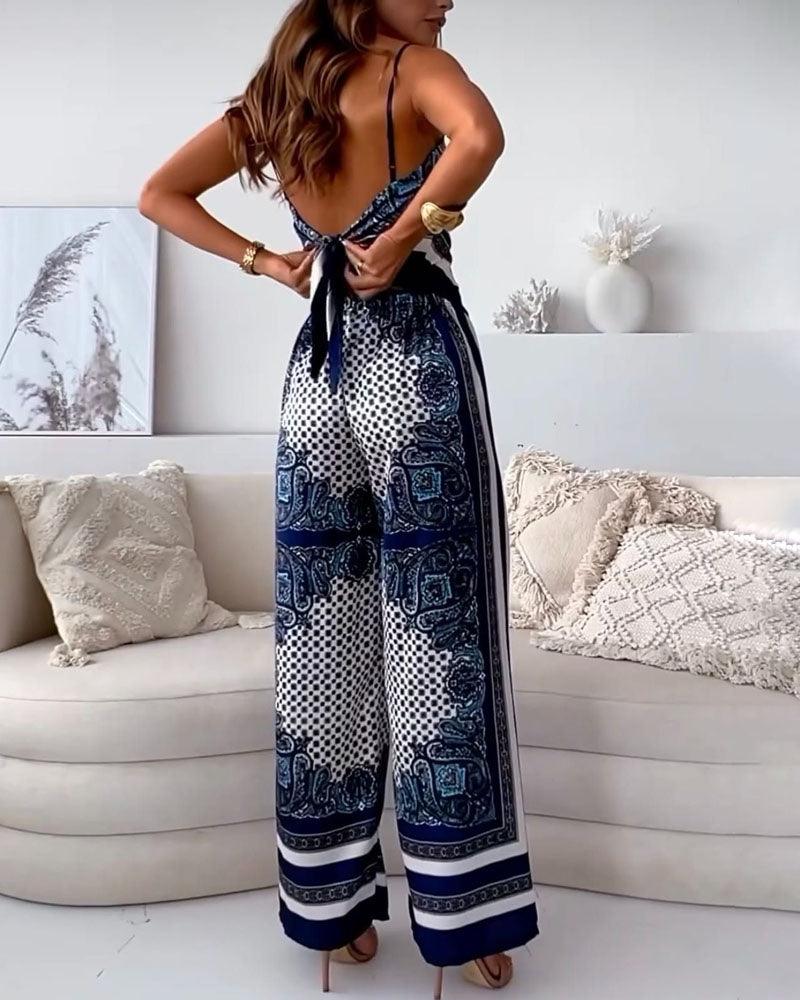 Set două piese cu vesta și pantaloni imprimeu elegant
