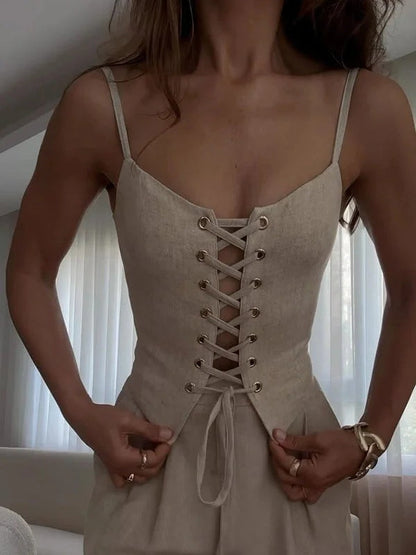 Set med två delar med axelband och rosett i linneblandning