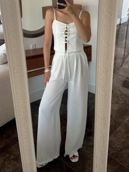 Set med två delar med axelband och rosett i linneblandning