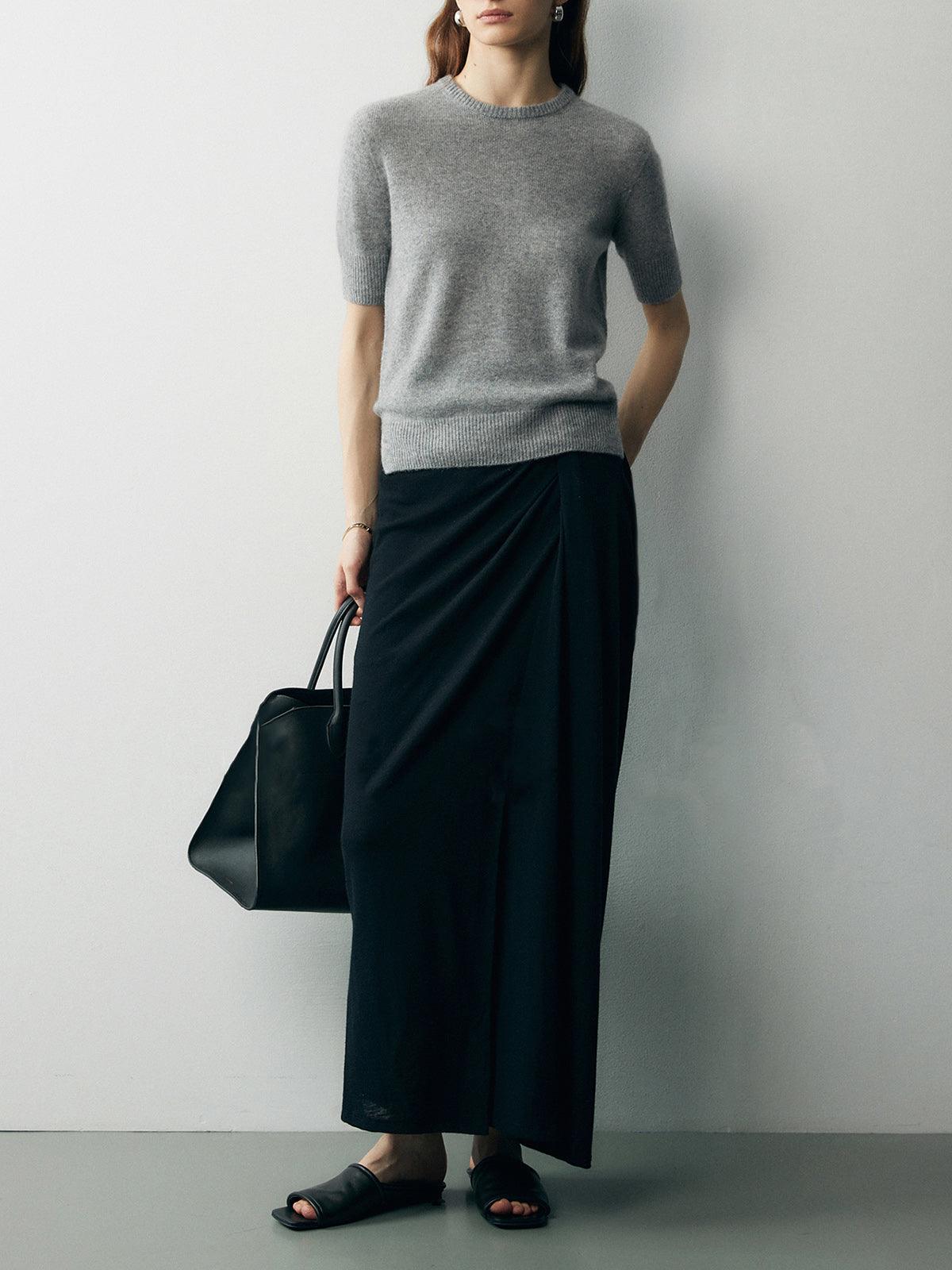 Set med två delar, asymmetrisk axel och plisseringar