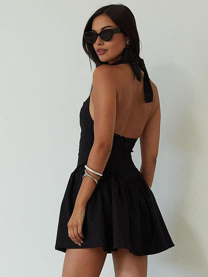 Kort klänning med korsett och halterneck-panel