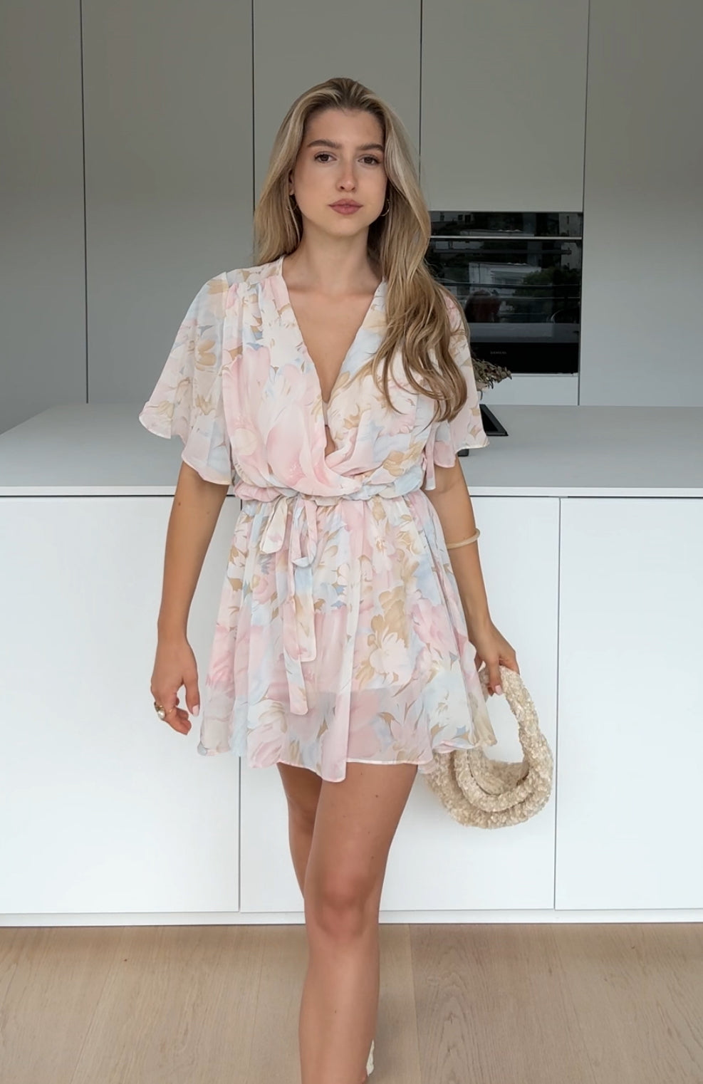 MINIKLÄNNING MED BLUMMAR