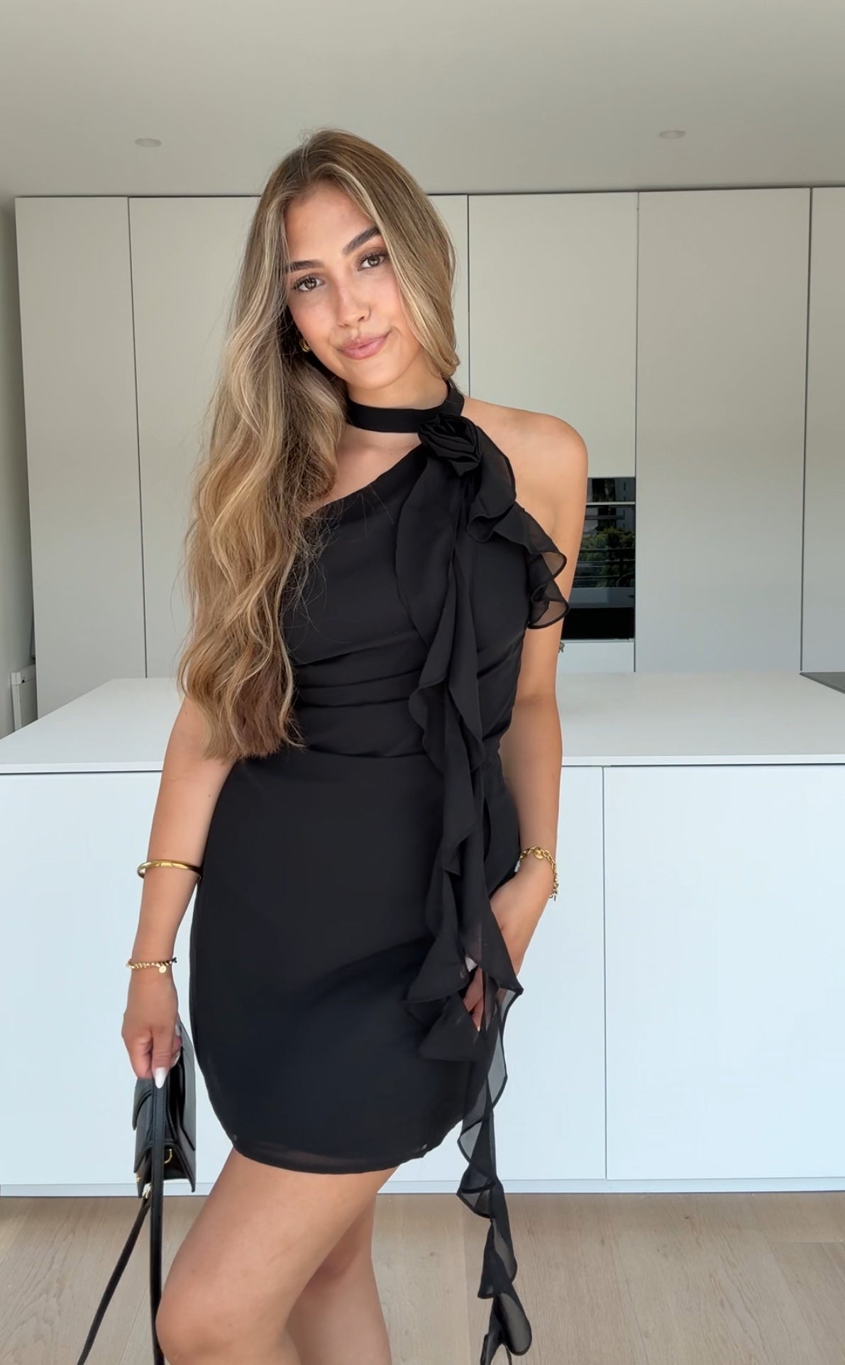 SVART VOLANGKLÄDSEL