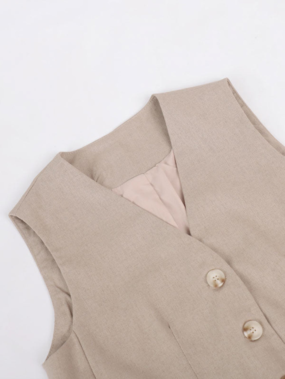 Breda byxor i bomull och lin, med veck, med klassisk V-ringning