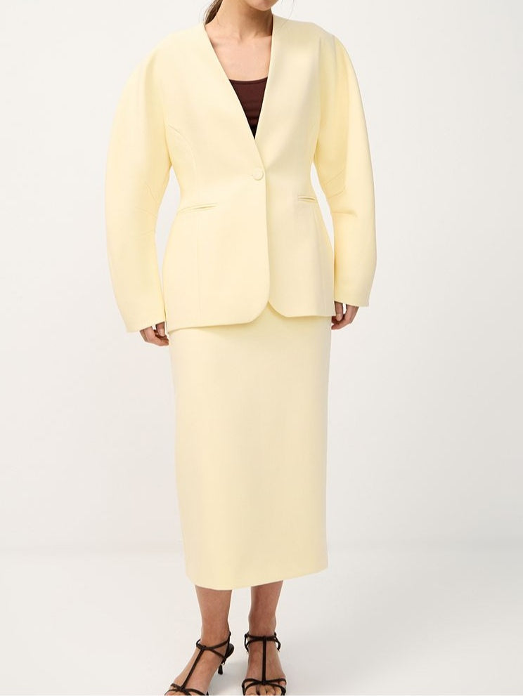 Jacka med böjda ärmar och kjoldress