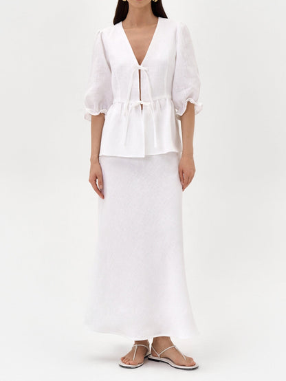 Gul topp med V-ringning och medellånga ärmar, högmidjad kjol, linne-set