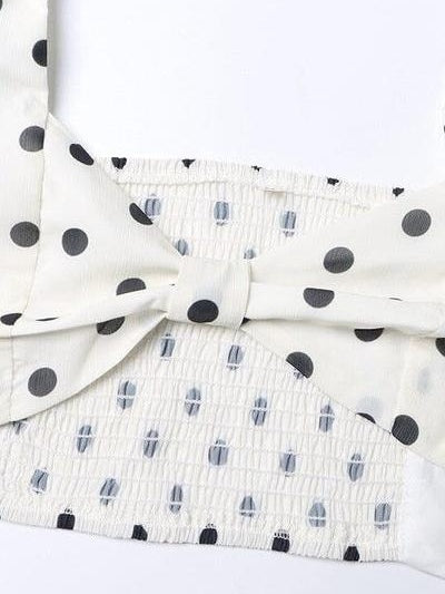 Set blus med fyrkantig krage och puffärmar med prickar och kjol med slits