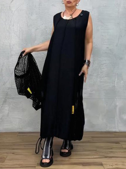 Klänning utan ärmar i svart mesh och matchande överdrag