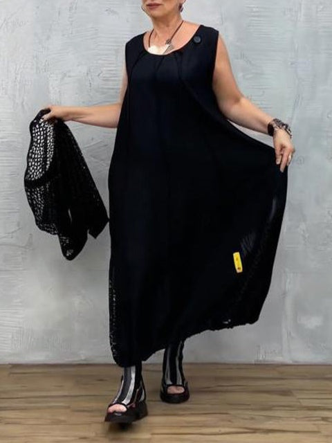 Klänning utan ärmar i svart mesh och matchande överdrag