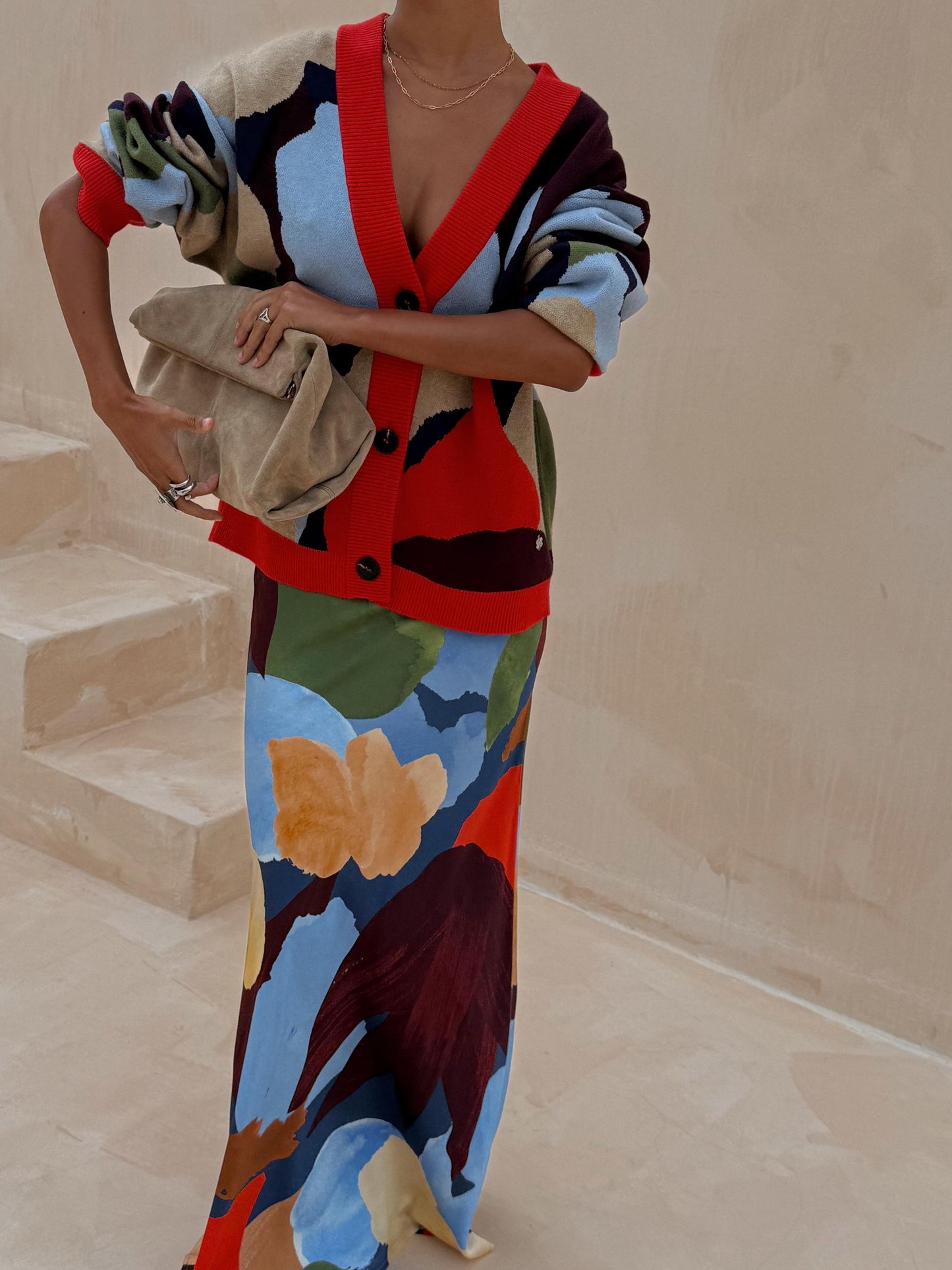 Stickad jacka med abstrakt geometriskt mönster + kjolset