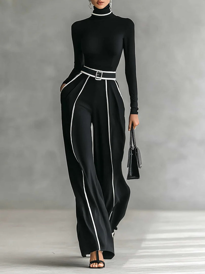 Set cu top cu guler înalt și mâneci lungi, cu pantaloni largi și curea