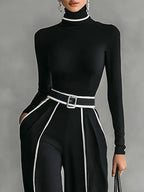 Set cu top cu guler înalt și mâneci lungi, cu pantaloni largi și curea