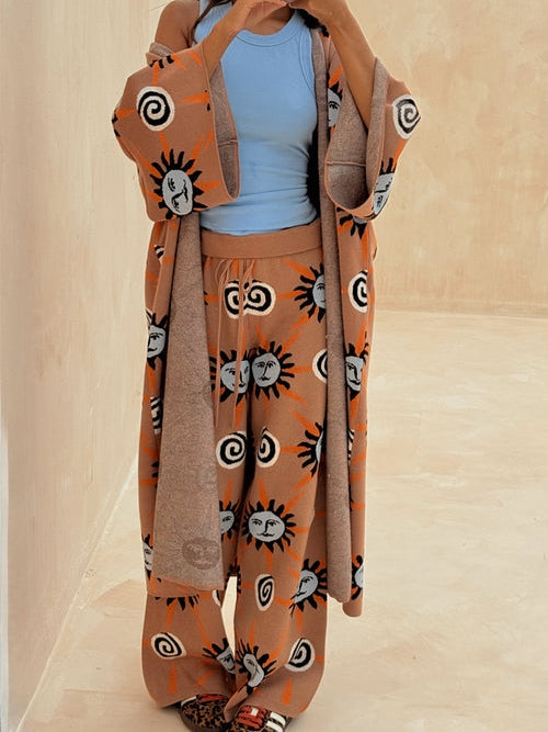 Stickad tröja med lång ärm, tryckt med sol