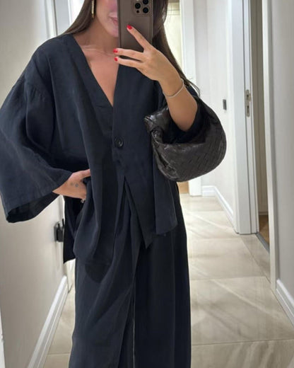 Set med två delar: casual topp med V-ringning och byxor