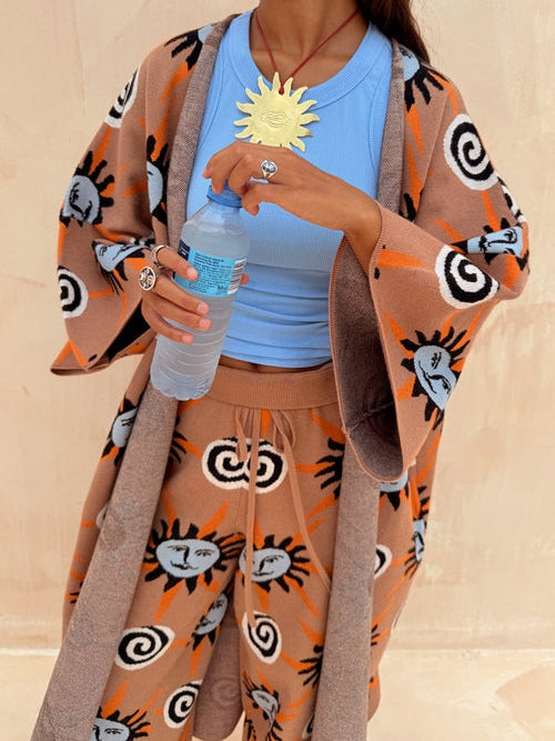 Stickad tröja med lång ärm, tryckt med sol