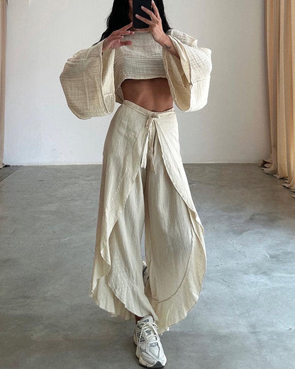 Set med casual byxor och slips, i två delar