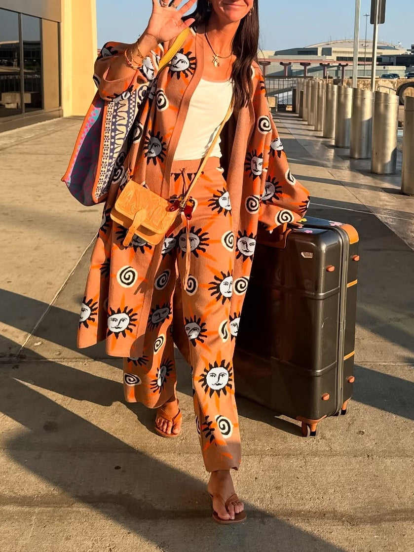 Stickad tröja med lång ärm, tryckt med sol