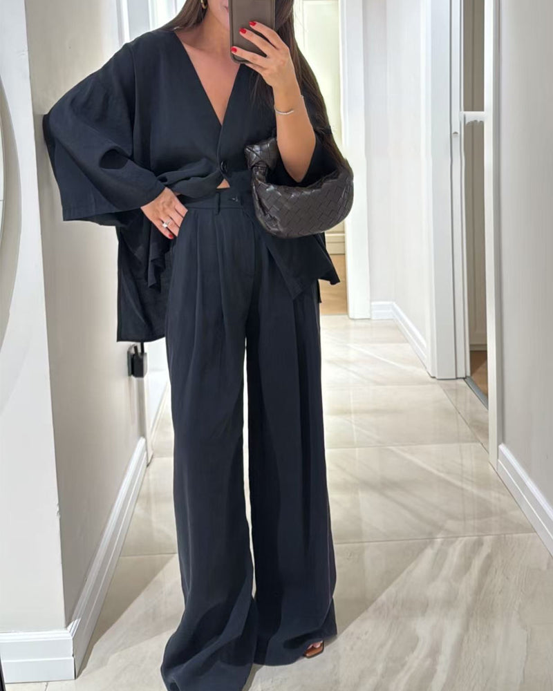 Set med två delar: casual topp med V-ringning och byxor