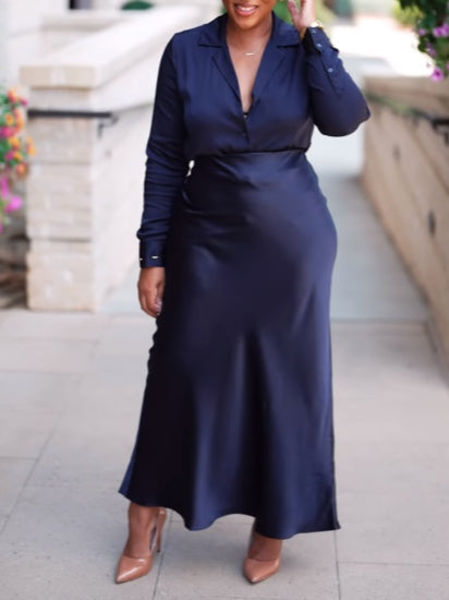 Mörkblå satinblus och lång kjol