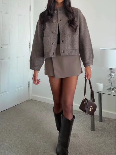 Set av stickad aviatortröja och culottes