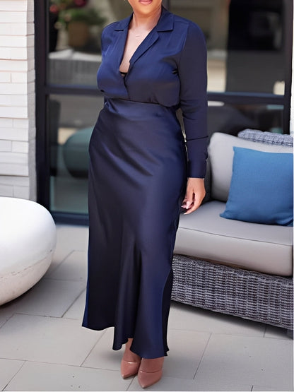 Mörkblå satinblus och lång kjol